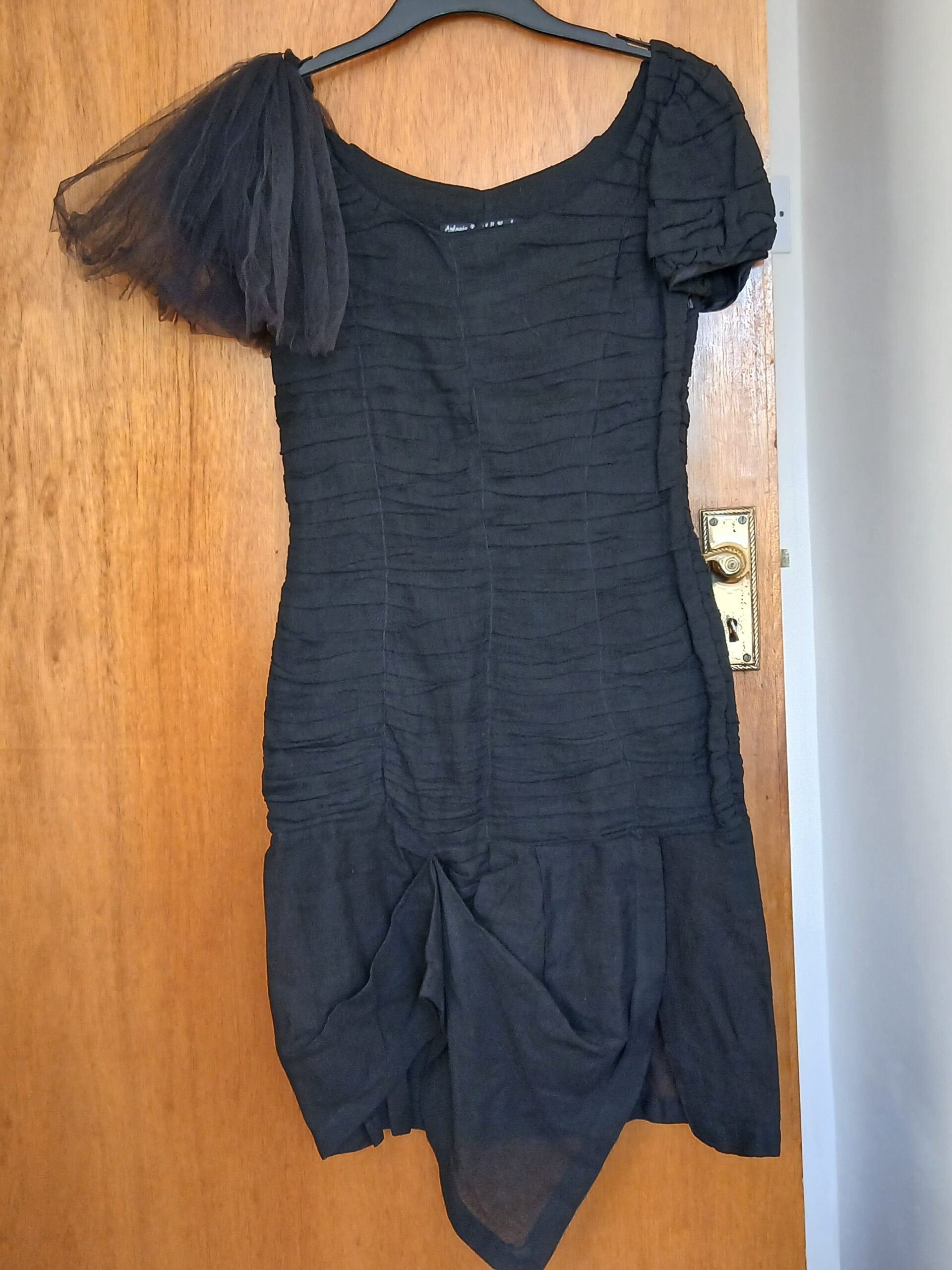 Antonio Campbell Hughes black dress